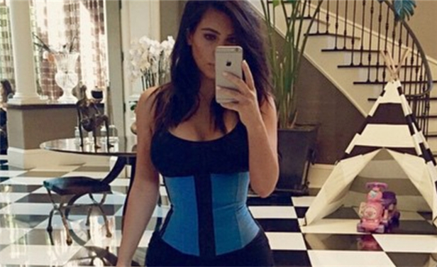 Why is it better to wear a high compression waist trainer when exercising?