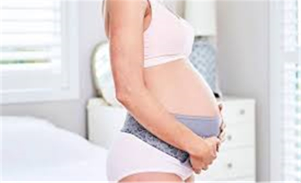 What is the effect of the auxiliary belt during pregnancy?